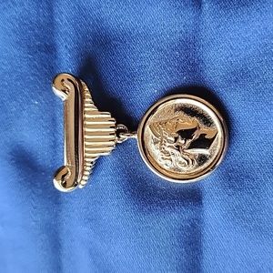 Vintage gold tone coin Monet brooch